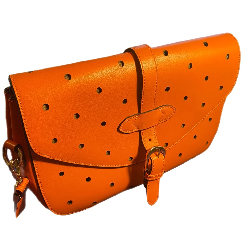 B collective by Buxton  orange clutch bag.